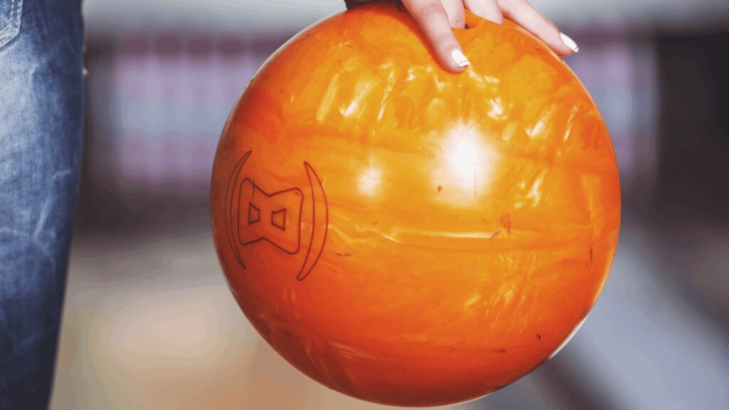 Orange Bowling Ball before being thrown