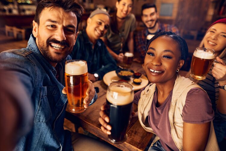 Friends taking a selfie in the pub